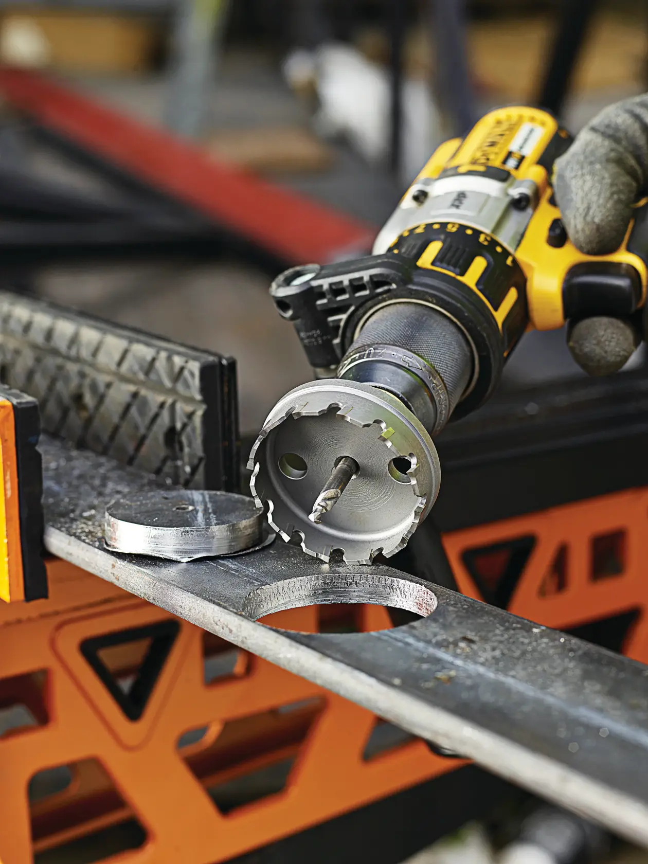 Graphic showing DEWALT XTREME Sub-Compact Series branding with the slogan 'Compact and Performance Packed' on a yellow background.