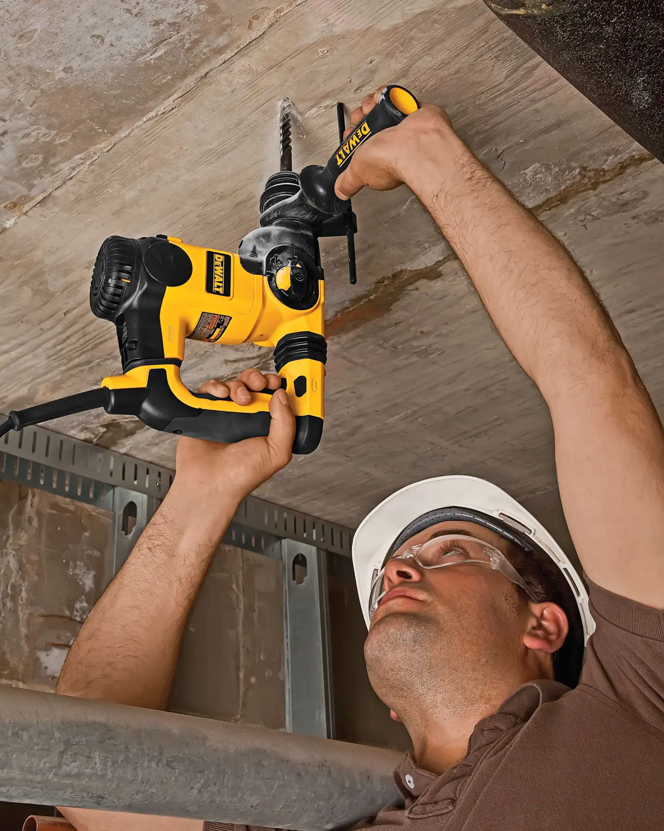 Person uses DEWALT drill, SKUs DT9620-QZ, DT9620, on ceiling. Photography product for ASIA, EMEAANZ region.