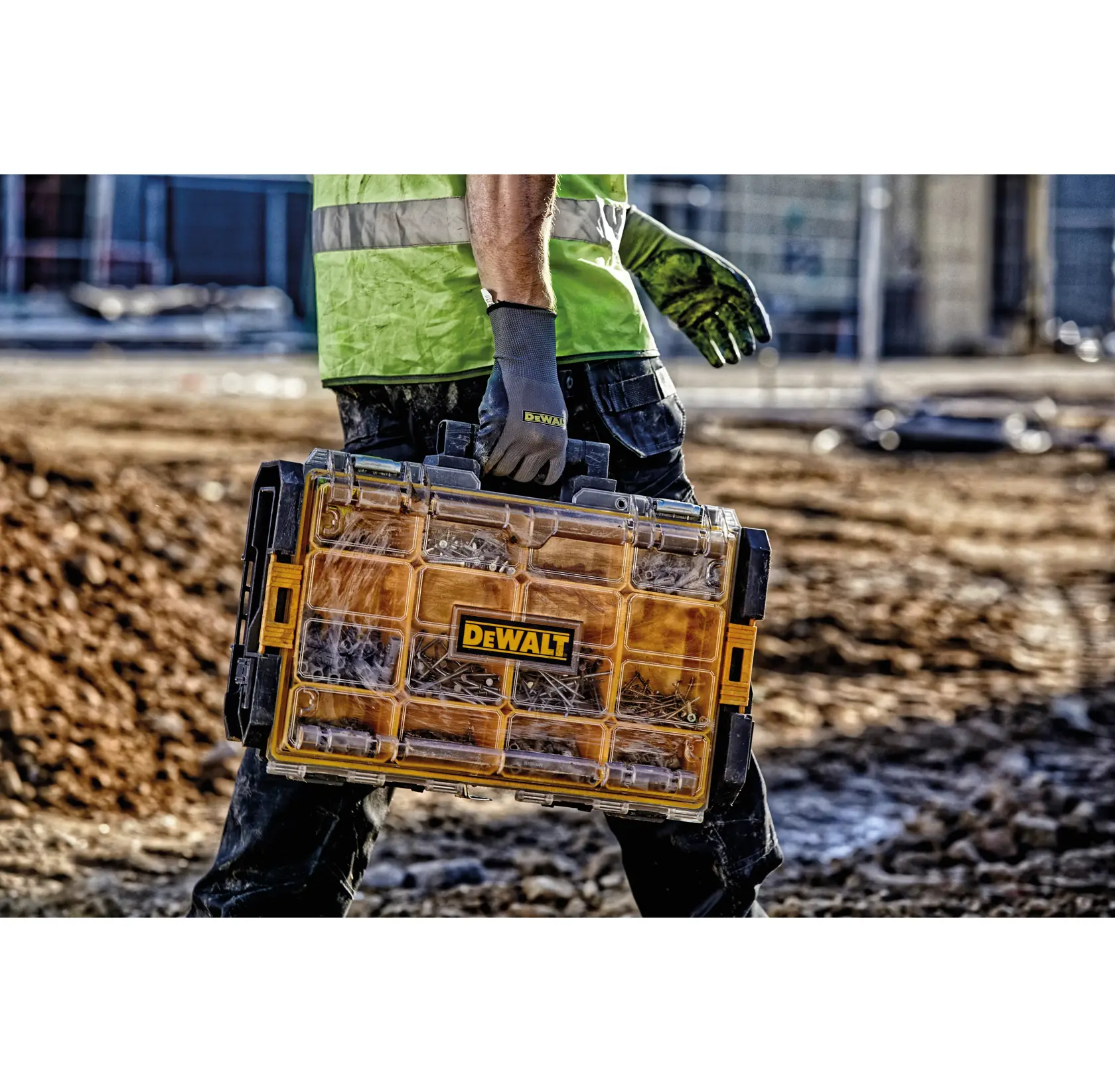DEWALT ToughSystem 2.0 promotional graphic with the slogan 'Storage Built to Handle It' in large, bold yellow lettering on a dark, textured background.
