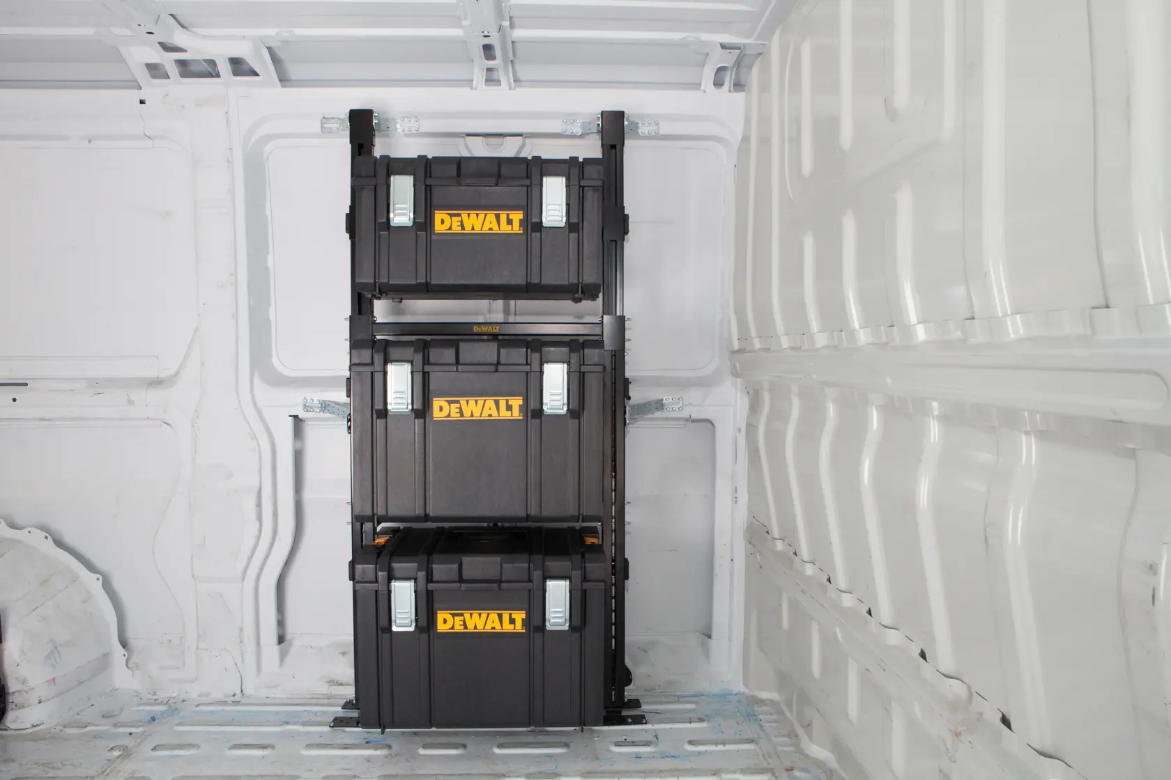 DEWALT ToughSystem 2.0 promotional graphic with the slogan 'Storage Built to Handle It' in large, bold yellow lettering on a dark, textured background.