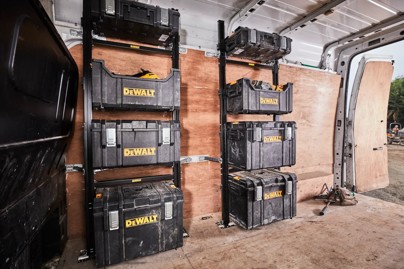 DEWALT ToughSystem 2.0 promotional graphic with the slogan 'Storage Built to Handle It' in large, bold yellow lettering on a dark, textured background.
